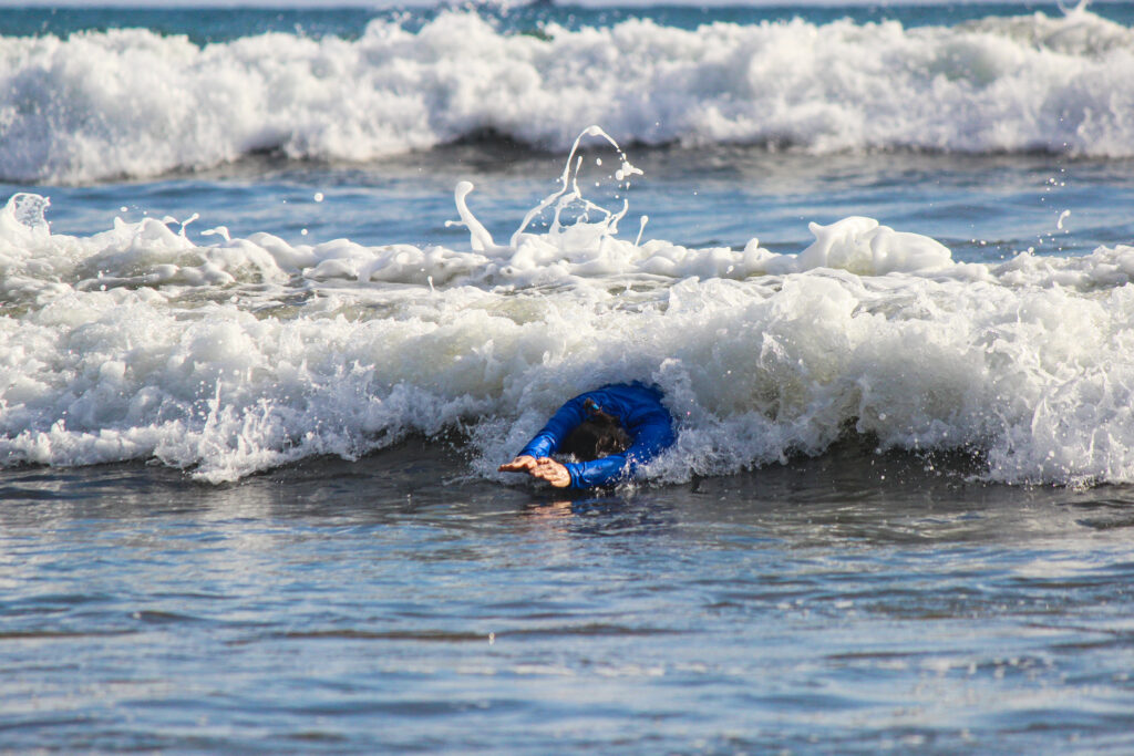 learning to surf catching a wave