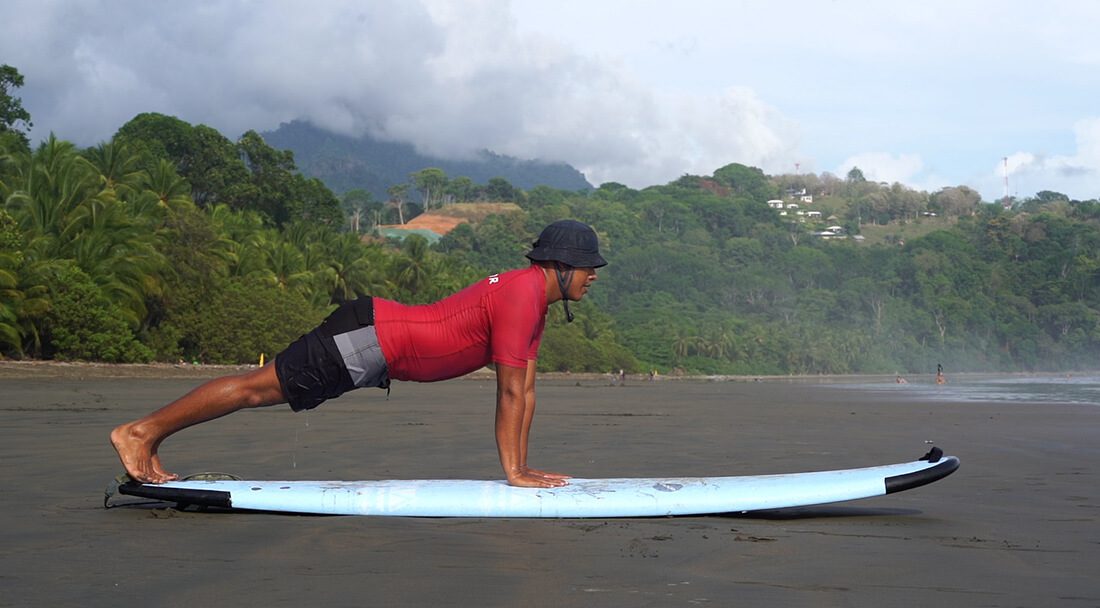 Plank technique to paddle past waves