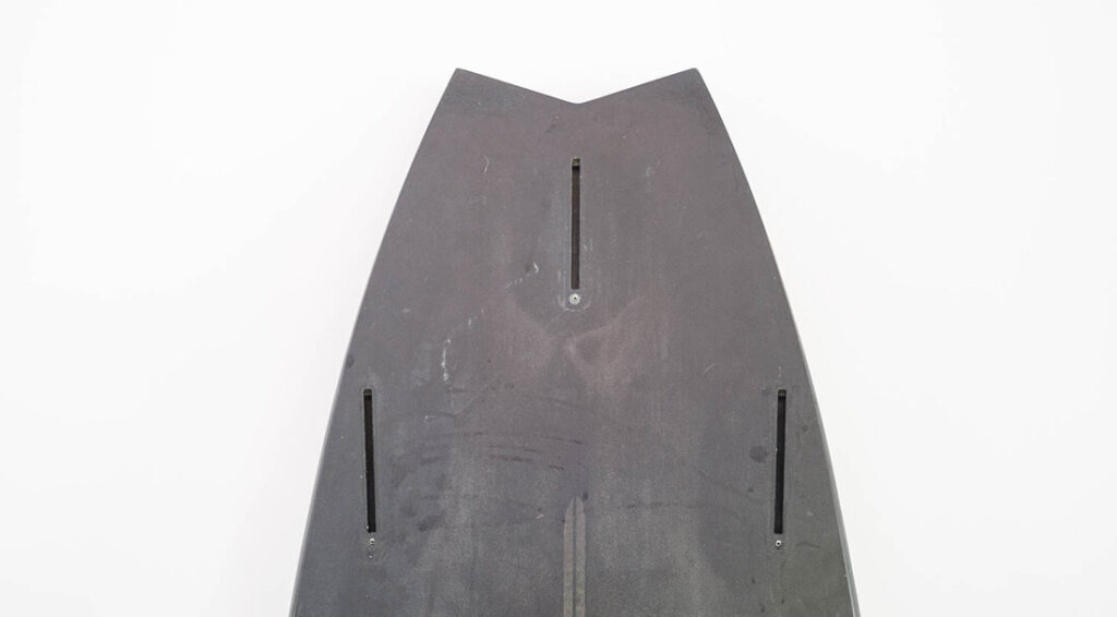 Three-fin surfboard setup
