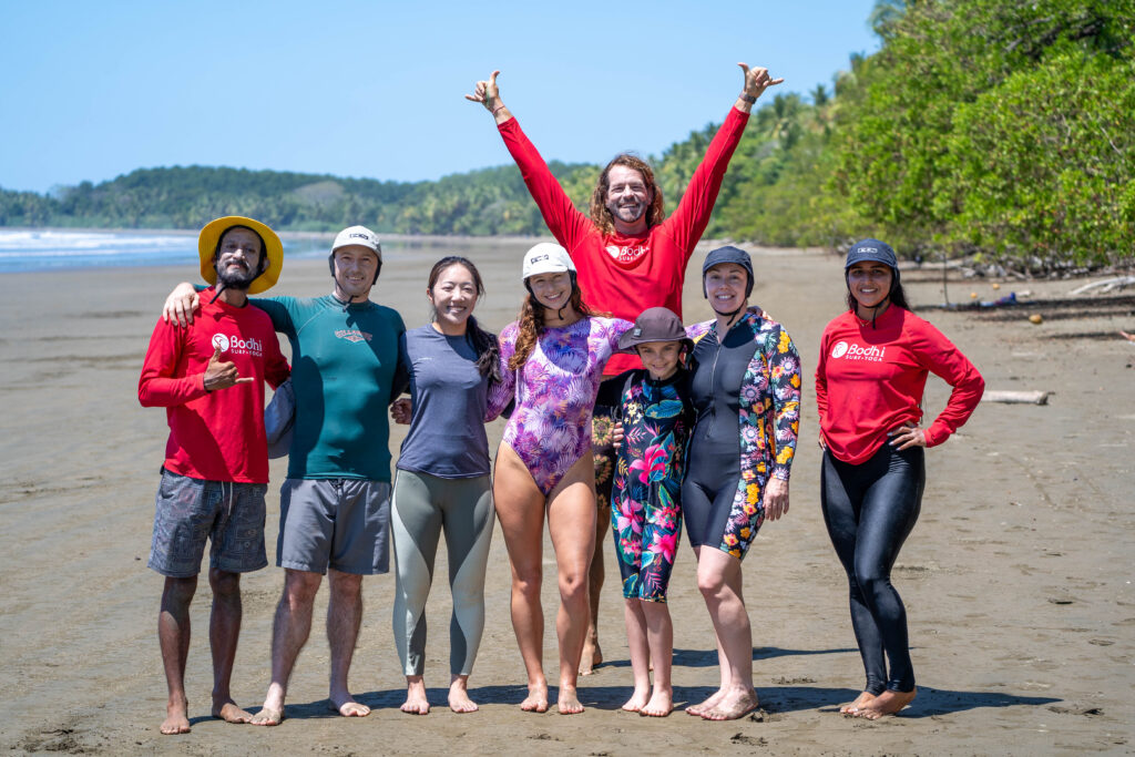 A group of Bodhi guests enjoying a summer day on the beach in Uvita