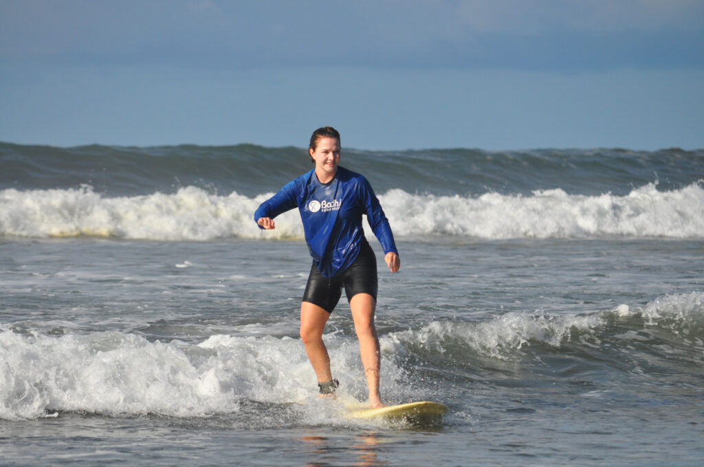 Surfing in the Marino Ballena National Park in Uvita, Osa, Costa Rica